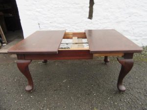 Edwardian Queen Ann mahogany dining table.