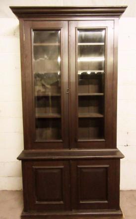 Late Victorian mahogany stained two door bookcase on base