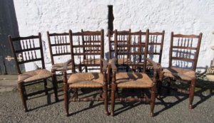 Set of 8 Victorian rush seated high back oak dining chairs