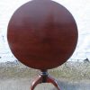 Georgian mahogany bird cage snap top table