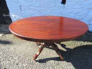 Victorian walnut tilt top loo table.