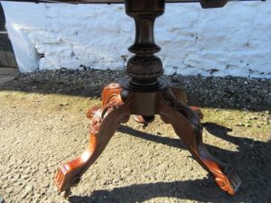 Victorian walnut tilt top loo table.