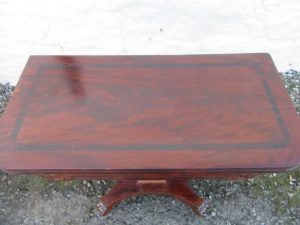 William 1V rosewood fold over card table.