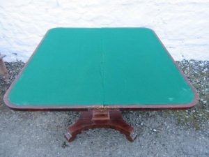 William 1V rosewood fold over card table.