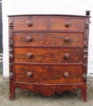 William IV bowfront figured mahogany chest of two over three drawers