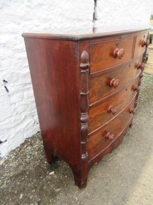 William 1V bowfront figured mahogany chest of two over three drawers