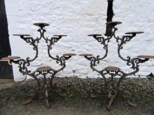 A 20th century pr of cast iron tree stands