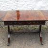 Edwardian mahogany stretcher sofa table.