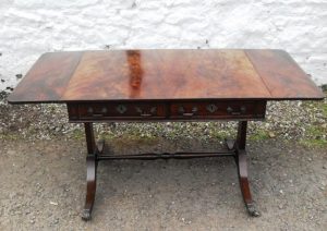 Edwardian mahogany stretcher sofa table.
