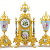 French gilded metal and porcelain clock garniture, circa 1885,