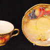A Royal Worcester Fruits cabinet coffee cup and saucer